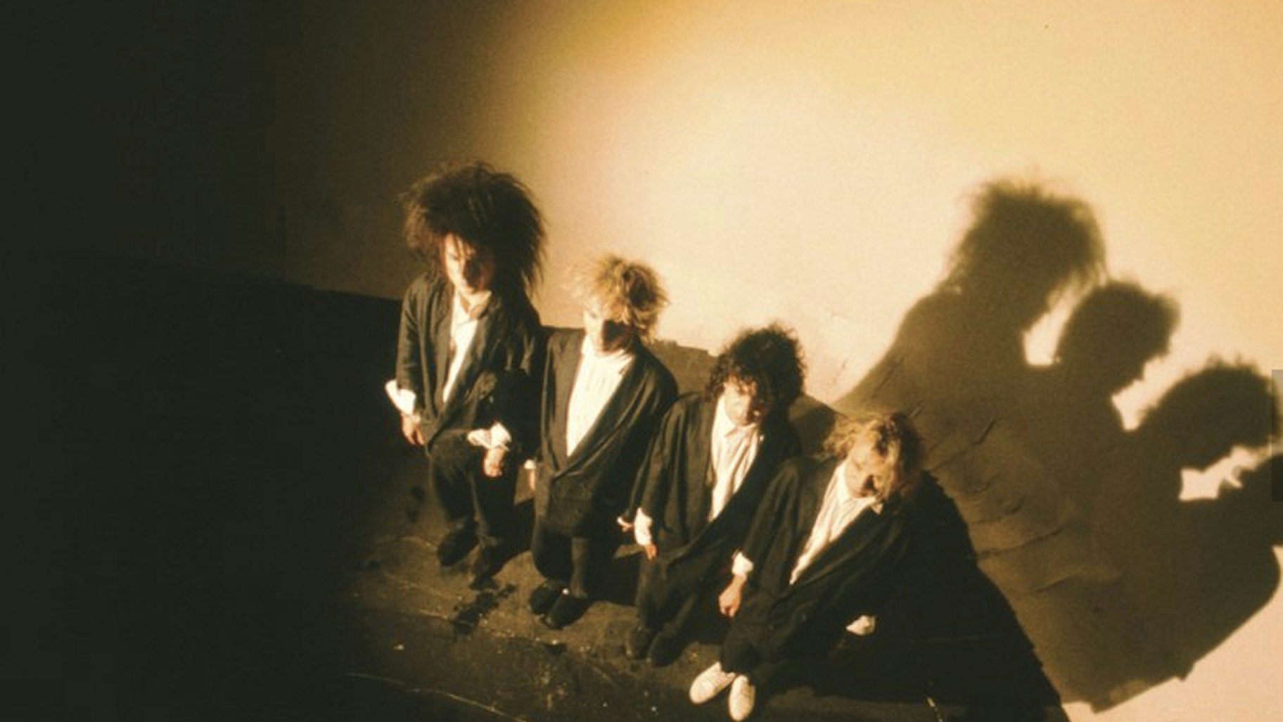 The Cure "Close to Me" - What did you do at the office today, dear? Oh, I filmed inside a wardrobe and got chucked off a cliff.
