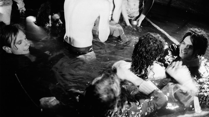 THE CURE "CLOSE TO ME" - Shooting the Close To Me video. That'll be Tim in the speedos, his back to camera.