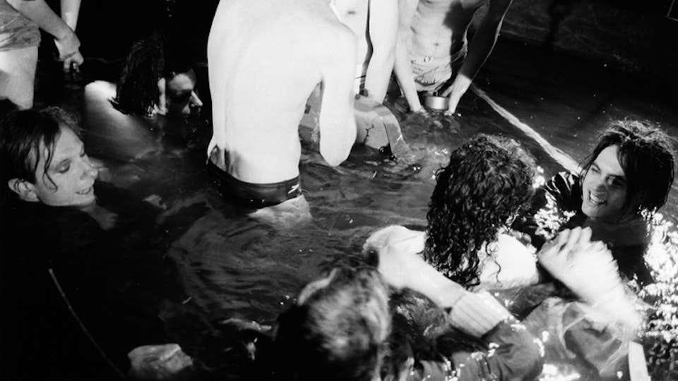 The Cure "Close to Me" - Shooting the Close To Me video. That'll be Tim in the speedos, his back to camera.