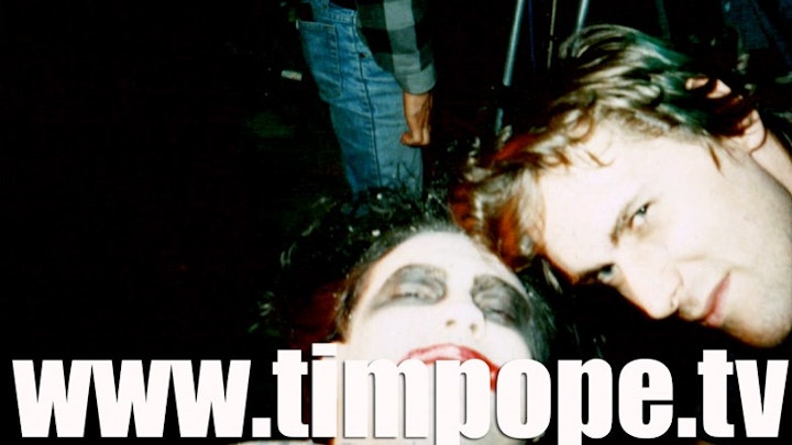 Robert Smith's revenge at Q Awards... - Pope with Smith, as he hangs in the spider's mouth during the filming of 'Lullaby'