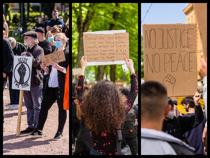 Three protestors with signs at BLM March Gothenburg