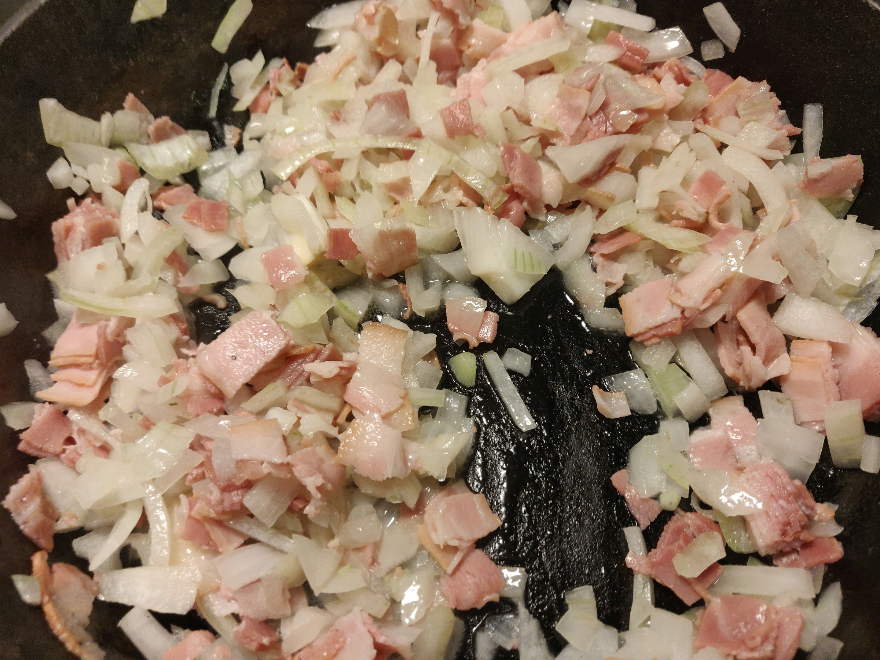 Frying the onions and bacon