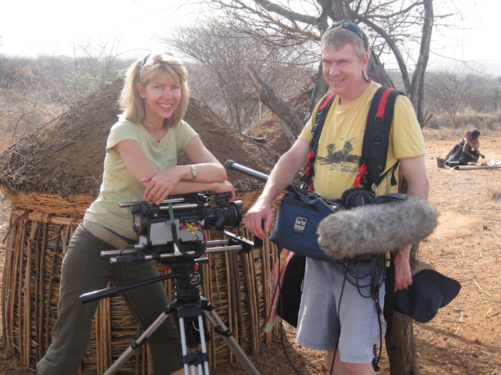 Mike and Kire at a remote homestead.  They had to walk for hours with their equipment - across the Kerio river,  in 40C heat to arrive here for the cleansing ceremony that had never before been filmed.
