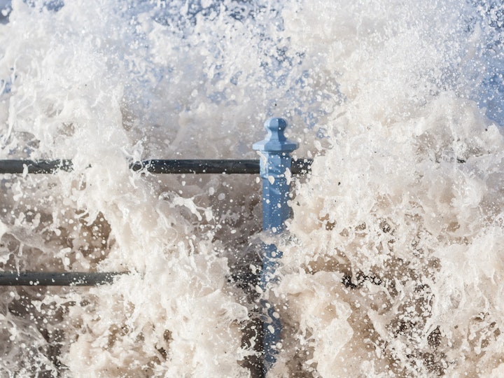 Storm Desmond whips up a froth on Morecambe Promanade.