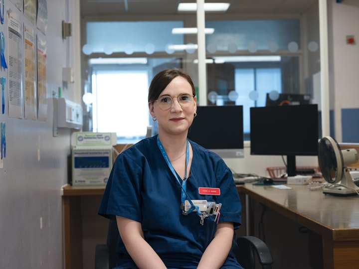 Open Britain x NHS Imperial Trust Collaboration - Carlotta Rimondo, - wWard nNurse, oOncology and Paleativepalliative wWard, Charing Cross
Carlotta Rimondo, studied nursing in her hometown inof Florence, Italy. She met her boyfriend on her nursing degree and moved here to be with him and to learn English.
Carlotta came to the UK pre-Brexit so in terms of her transition, . It was very easy, she just had to translate her degree certificates and give them to the ‘Nursing and Midwifery Council’ in order to practice. N, now things are harder with strict English exams and more hoops to jump through.
As a Band- 6 ward sister she finds herself less patient -facing as she leads a team of five nurses and three healthcare assistants on every shift. Her ward has many long-term patients and those in need of end-of-life care.
Other than her husband (the boyfriend she met in Florence) who is an ICU nurse on the floor above, medicine is not something that particularly runs in the family. That is the same boyfriend that she met back studying Nursing back in Florence. With a new baby on the scene, Carlotta has now moved to part-time Hhaving worked With 12twelve--hour shifts day and night previously, Carlotta now has a new baby has moved to part-time. previously. Not only has Carlotta settled in the UK, she has now grown new roots through her child. and a new baby on the scene Carlotta is now part-time.
.
