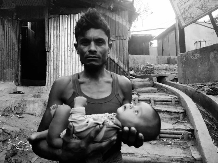 Father & Child. Image by Noor Hossain