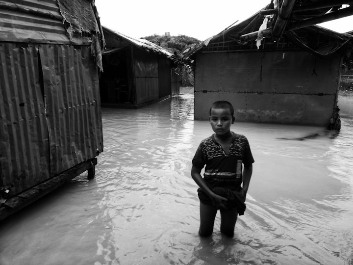 Annual flooding in the camps by Mohammed Salim Khan.