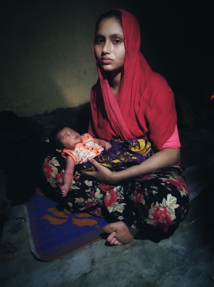 Mother and child by Noor Hossain