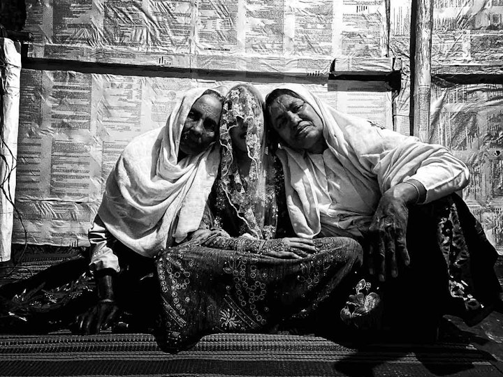 The bride is sitting with the aunt and  grandmother of the husband. Image by Mohammed Salim Khan.