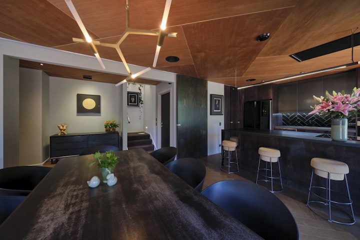 The Black House part two - The Herringbone ceiling matches the floor in this Architecturally designed award-winning home in Queenstown designed by Architect Stacey Farrell