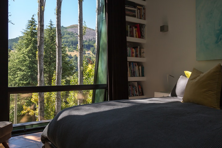 The Black House part one - The view from the bedroom at the Black House in Queenstown designed by Architect Stacey Farrell to sit high amongst the trees