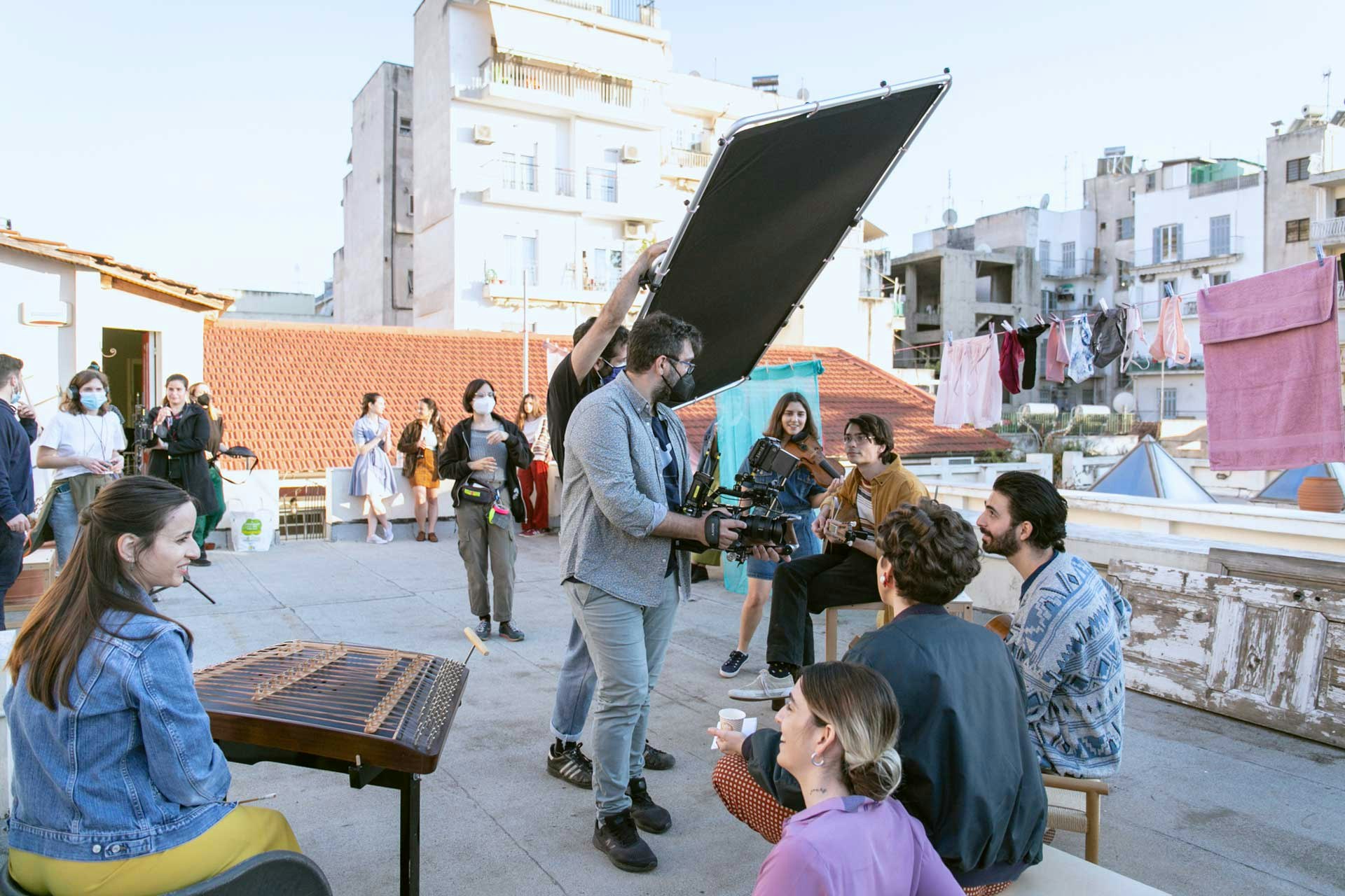 Backstage. Negative fill to create some contrast with excellent gaffer Giorgos Sintosis.  Photo by Iliana Bennet