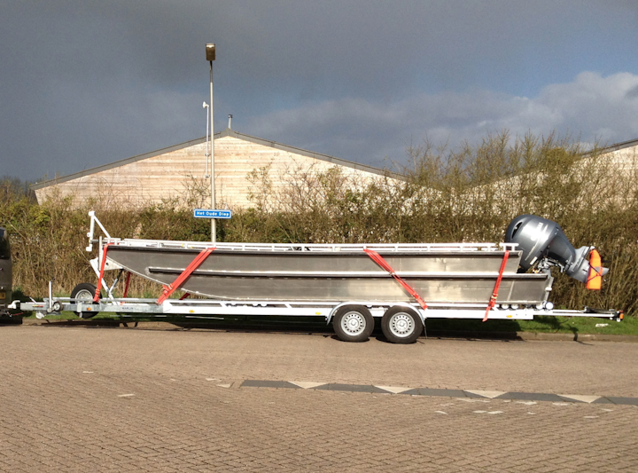 8 x 2.4 metre (Large) Camera / Crane Boat fully mobilised on braked road trailer.
'Large Camera or Camera Crane Boat' + 175HP Yamaha 4-Stroke: Large Payload - Up to 12 people (incl. 'Skipper') + Camera or Crane Equipment (or an approx. total of 2000 kg). A very light and fast craft given its size and payload capabilities - with additional secure 'Dry Locker' space at the rear for particularly sensitive equipment and valuables.
The Bow / Front of this boat can be lowered like a 'landing-craft' to facilitate loading on a 'shoreline' where possible - Camera or Crane equipment can usually be wheeled straight-in and secured. This boat is also particularly good for filming, or tracking 'Hero' boats with a Camera Crane on board - as the crane arm or boom, enables camera close-ups of the 'Hero' boat occupants and areas inside. This is a bespoke Camera Boat with practical heavy-duty tie-down points located on the floor sides. The standard scaffold tube handrail allows the infinite location of a multitude of fixtures with couplings common to any film studio or 'set' - even down to the waterline - ideal for Grips.
*Both Camera Boats have a height-adjustable Camera Chair accessory: This quickly slides into the fixed scaffold tube receptacles and allows the Operator a 270 degree POV (with nothing in front or below) or being above and looking down on a subject.
***All boats come with the latest ultra-quiet Yamaha 4-Stroke outboards: Very low emissions; No waterborne pollutants emitted; 'Propguards' on every outboard - for safety; 'Suppressed' spark-plugs - so no 'interference' with any 'Sound Equipment'.