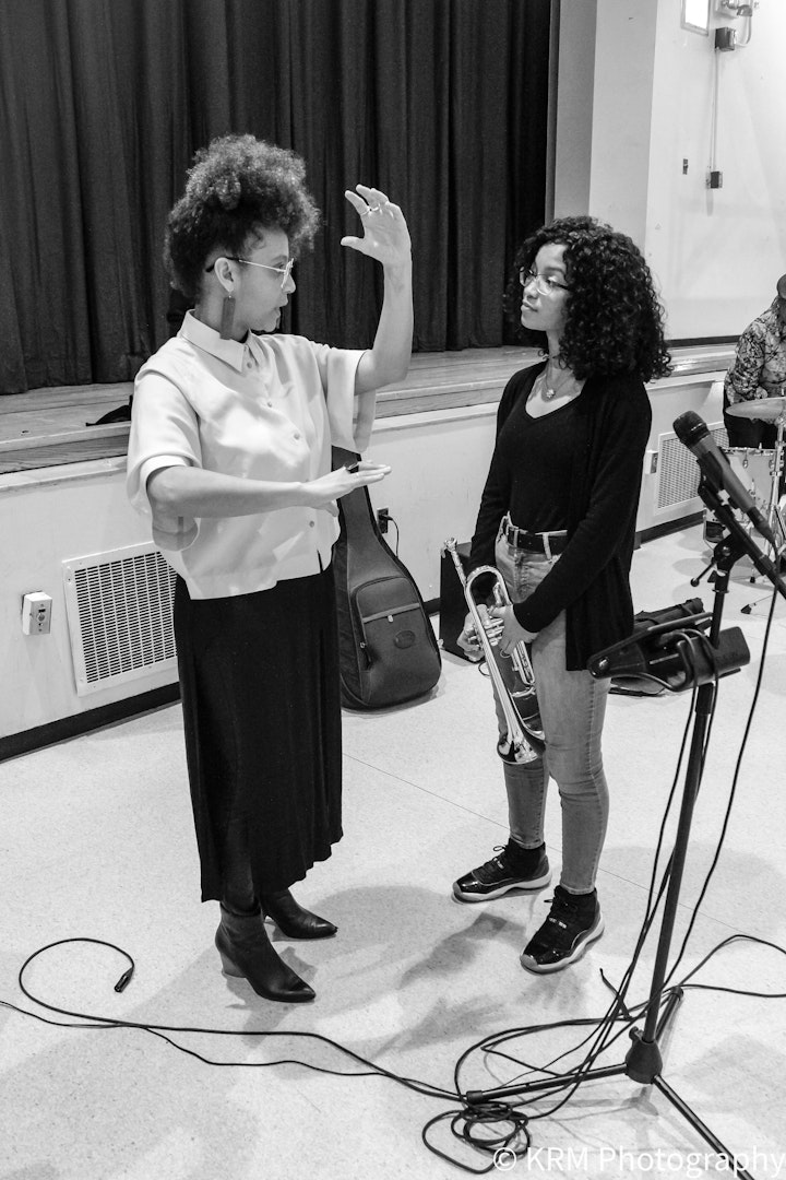 Sarah Elizabeth Charles (Jazz Singer) teaching student during masterclass at Wheels School in Washington Heights,NY.