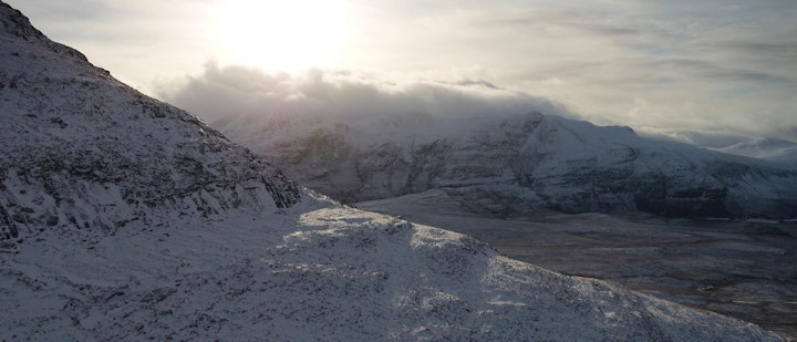 Beinn nam Ban. "the white mountain"