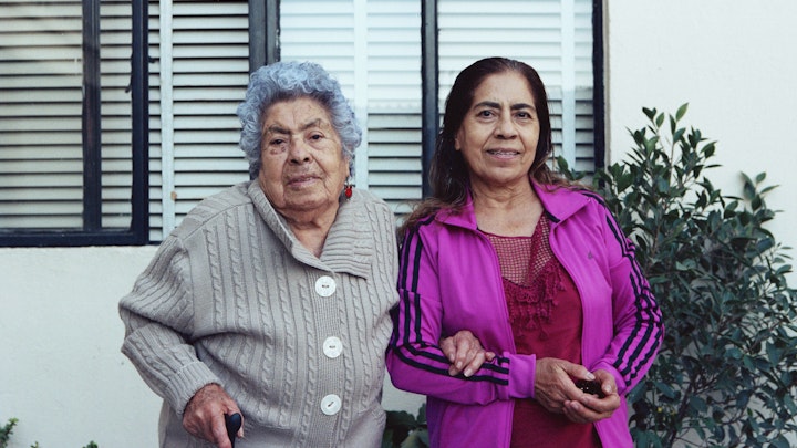 Photography - Aurora with her daughter Amelia. Aurora put me up for 7 months in Oaxaca, México. She was a tireless 89 year old matriarch when I lived with her. I think the only time she was caught sitting was when she was eating, or between 8 and 9pm when her favourite tele-novelas were on...