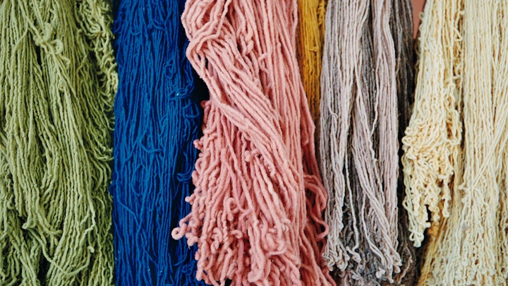 Photography - A lot of their natural dyes are more vibrant and long-lasting than synthetic ones. The pink in the middle is made with diluted 'cochinilla' plant, and is a widely used dye in the area which can produce a striking red.