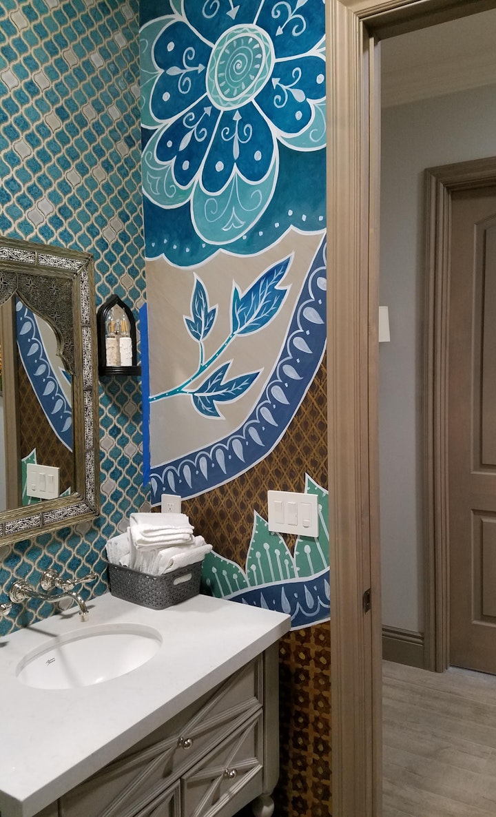 The aqua and white wall behind the sink and toilet is tiled. (I see I took this pic before I removed the blue masking tape in the corner. Oops)