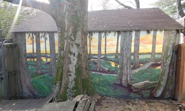 The owner was in the process of rebuilding the deck, but the mural came first. I liked his priorities.