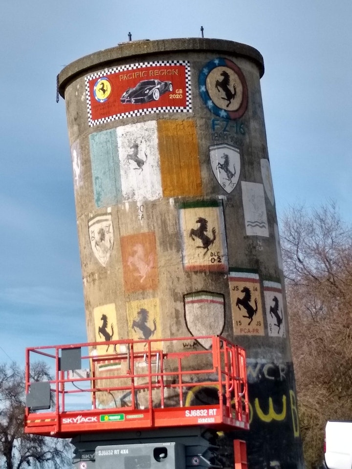 For many years (25? 35? not sure) the Ferrari Club of America, Pacific Region has held an annual rally from the SF bay area east through the winding Delta roads, ending up here at this disused water tower. The owners of the tower have generously allowed both this gathering on their land, and each club president to have a commemorative logo painted on this tower. In 2020 it was my turn. (No, I don't own a Ferrari).