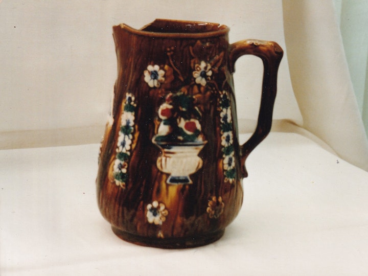 Photograph on Bob's collection of a fine example of a jug made at the Yate Pottery.