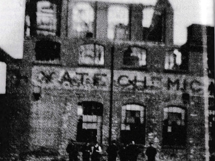 Copy of a photograph (E & T Wilson) of Yate Chemical (Ochre) Works in Eggshill Road  just after a fire at the factory in the early 1930s from the book; 'Childhood Memories and Reflections of North Road, Yate and Surrounding Area by Glenys Hale'.