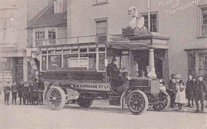 Early bus service by Bristol Tramways & Carriage Co. Ltd. between Horefield in Bristol and Thornbury outside the Swan Hotel in Thornbury in Gloucestershire (A. Prewett, Thornbury) posted on 15th May 1906. The Swan is Thornbury's original coach houses and one of the oldest buildings in the town after the castle.
Notice the registration number of the vehicle: AE 731. The bus in the very similar previous postcard had the registration of AE 730.
In 1887 the Bristol Tramways Company merged with the Bristol Cab Company to form the Bristol Tramways and Carriage Company. The new company developed a fleet of omnibuses to serve the rest of the city and country areas including Thornbury. Note that electric trams were introduced in Bristol in 1895, the first city to do so in the United Kingdom with 237 tramcars covering 17 routes.