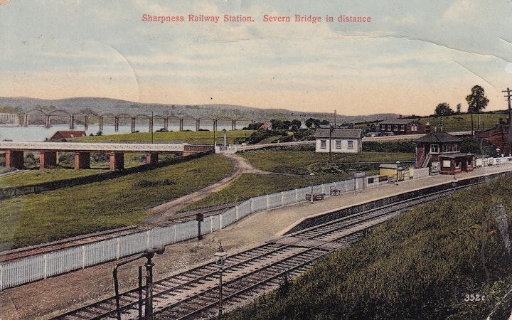 Sharpness Railway Station (Gloucestershire) with the first Severn Bridge in distance (Tilley & Son, Ledbury) posted on 28th November 1918.