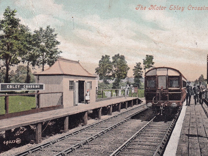 The Motor at Ebley Crossing near Stroud on what is now referred to the 'Golden Valley Line' posted on December 4th 1909 (Valentine's series). Note that the station sign is spelt 'Halte' instead of the usual 'Halt' and is coloured suggesting that this is part photograph part drawing / painting. The word Halte was perhaps painted on by a German speaking artist....