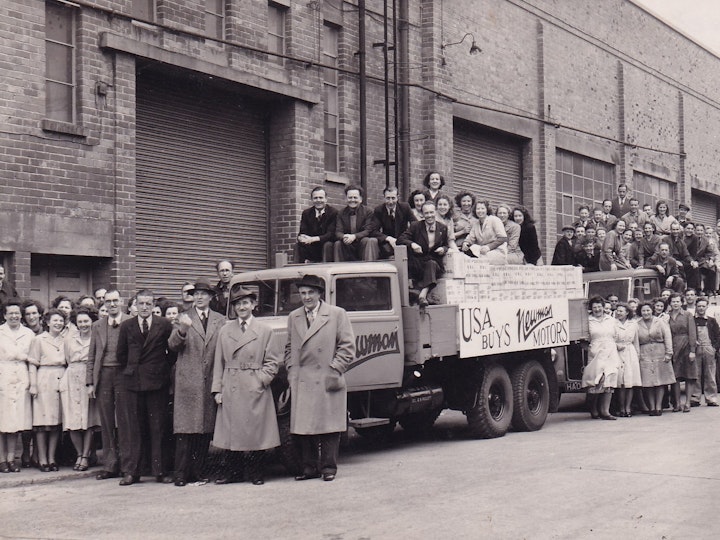 Original photograph (Desmond Tripp of Bristol) of Newman's Motors staff at their Yate factory in a photoshoot celebrating breaking into the U.S. market in the early 1950's.