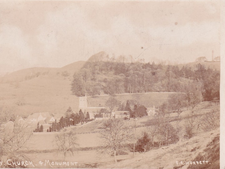 Hawkesbury Church and Monument (plus the neolithic long barrow on top of the hill in centre of image) (E.R. Werrett, Hillsley) 1/2.