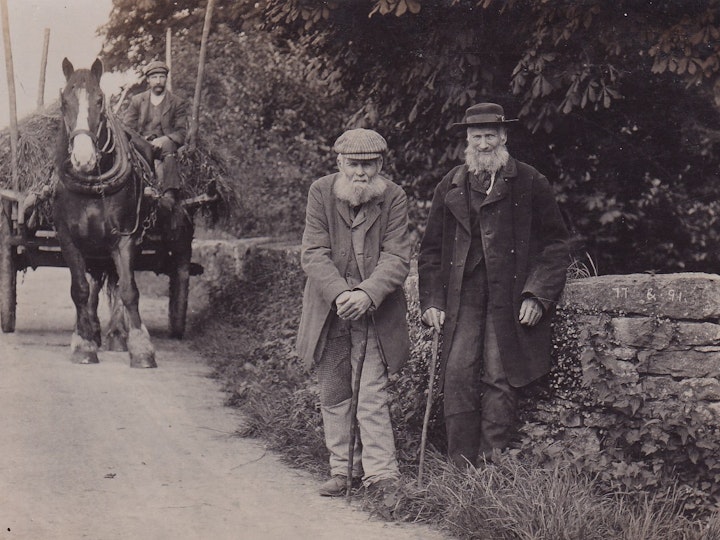 Postcard of William Taylor and Thomas Stevens (Gardner Photographer, Bampton) with their respective ages written on the coping stone of the bridge! Presumably taken on a bridge somewhere in or round Lechlade where the card was sent from on October 3rd 1912. 1/2.