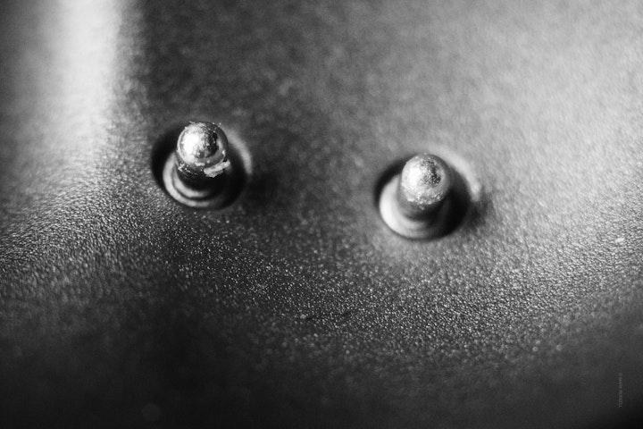 Macro super-closeup of electrical contacts in black and white.