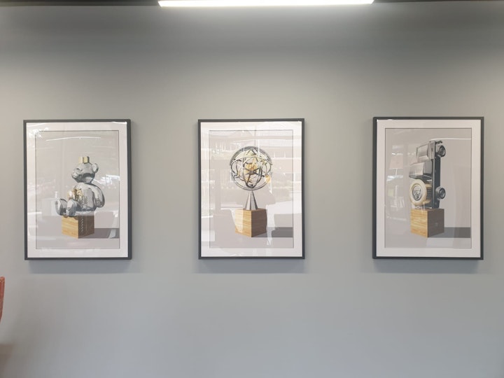Contemporary art trophies. Bespoke art collection. Printed, framed, and installed. The Oaks by Student Roost.