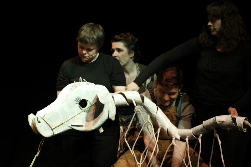 Into the Woods - Milky's head was fashioned from cardboard with bamboo rods to articulate her mouth and ears. Her head was hollow and large enough to hide the items she had to 'eat' during the performance.