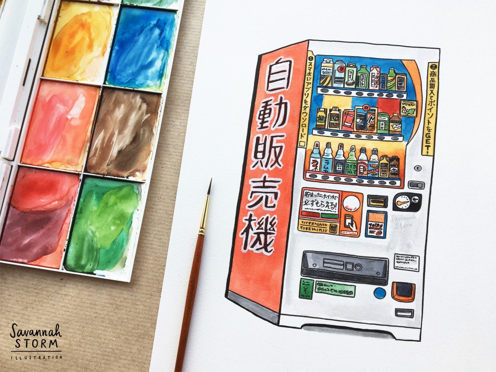 A painting of a Japanese vending machine, drawn on white paper using watercolour paints and ink. A paint palette and paintbrush rest next to the artwork.