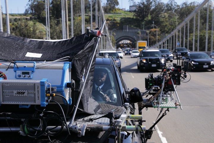 Actor Ahku runs the scene in the picture car while being towed with California Highway Patrol behind us for safety.