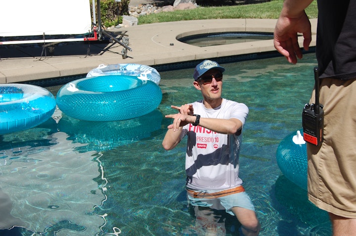 Cinematographer Jesse Eisenhardt shows how deep the pool is.