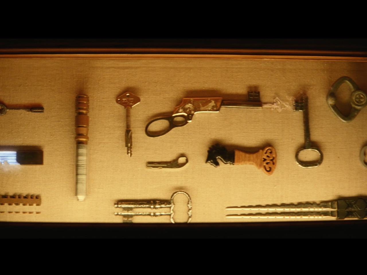 Keymakers workshop - cabinet of hero keys - (still from commercial)