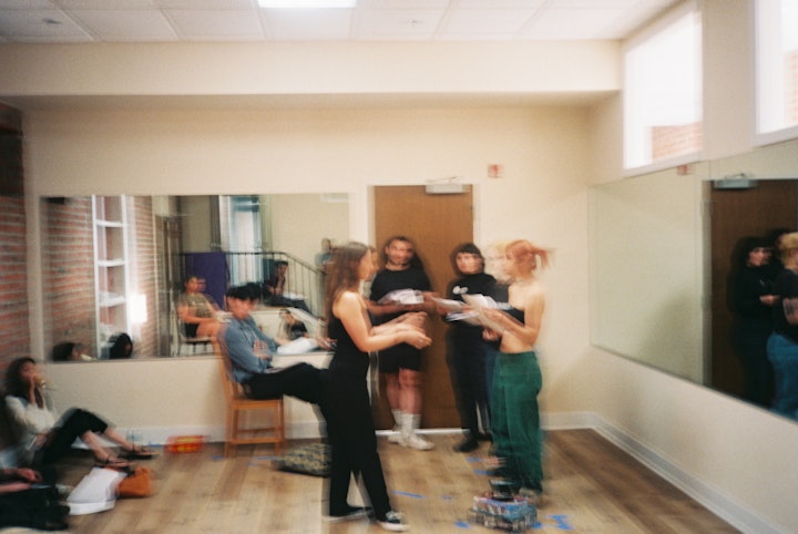 A DAY IN THE LIFE - A blurry film photo of Hannah and i talking over the scene during rehearsal.