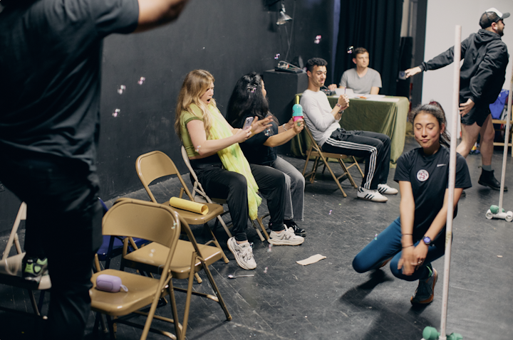 NEXT STOP - Dancers creating magic on the train with McCullen on sound at the desk in back. Rehearsals were held every Wednesday evening at Vox Populi from February to April.