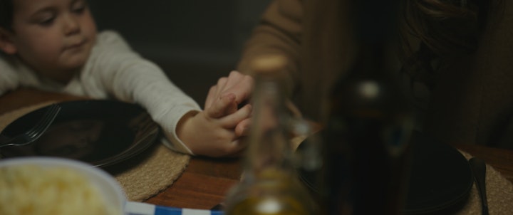 holding hands at dinner table food and drink