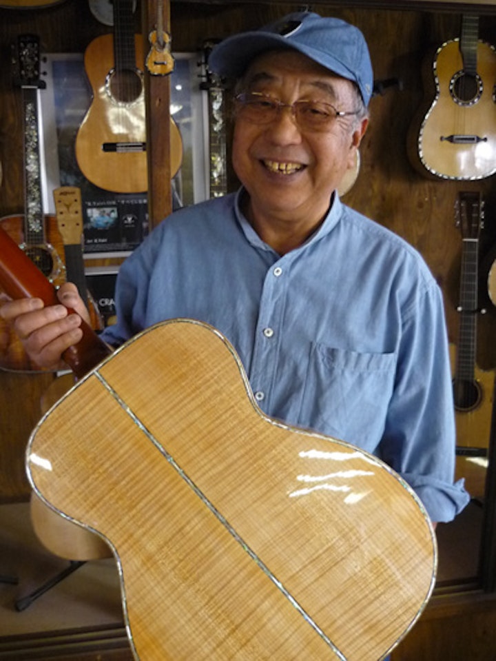 Mr Kazuo Yairi kyairi_Mr_Kazuo_handing_guitar4