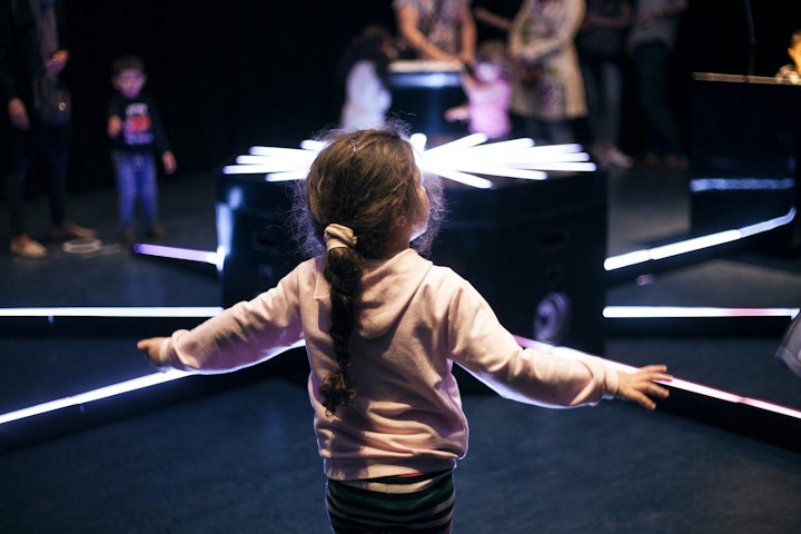 Cave-of-Sounds-Tim-Murray-Browne-5-Child-creating-music-through-moving-her-arms-at-Watermans-Arts-Centre-London-0637-Photographer-Anastasia-Alekseeva-2048x1365 -