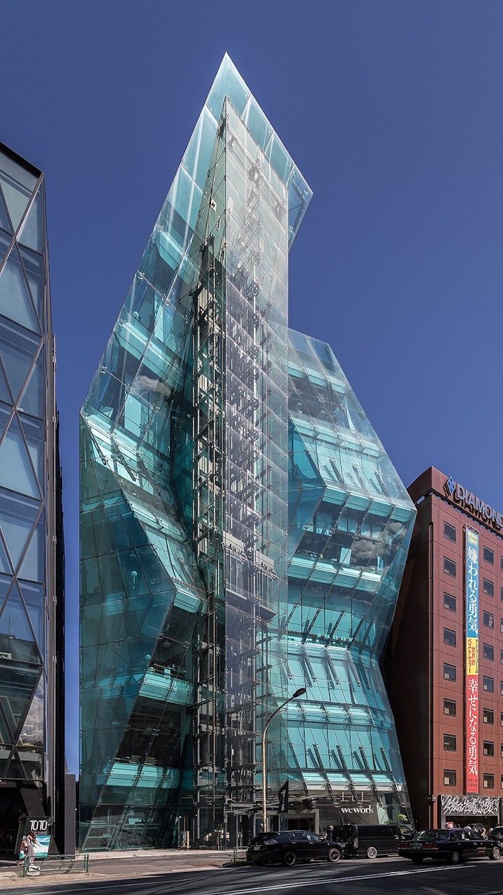 Interiors & Furniture - Facade_of_the_polyhedral_glass_building_The_Iceberg,_Shibuya,_Tokyo,_Japan