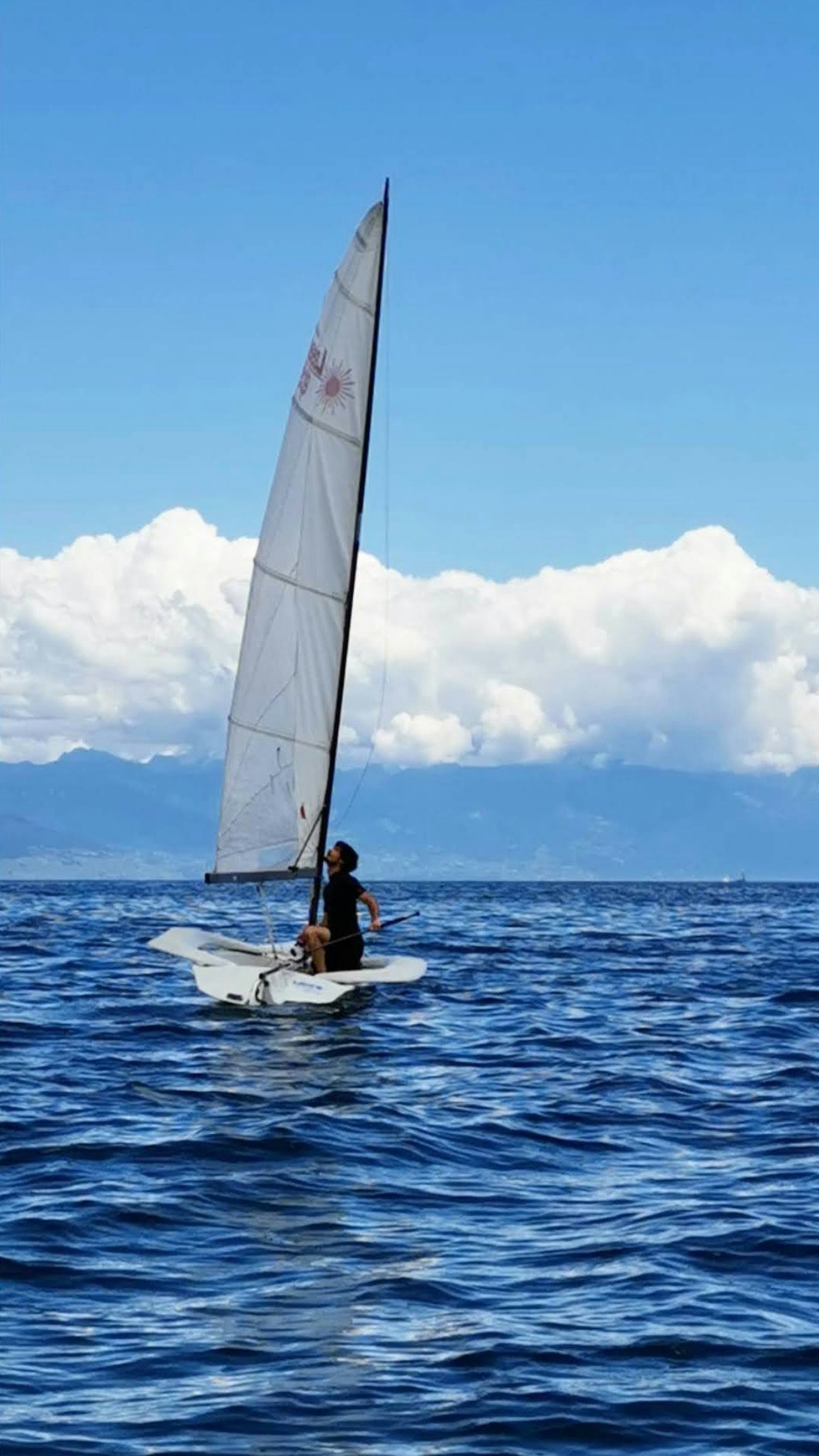 Marc Surchat sailing dinghy