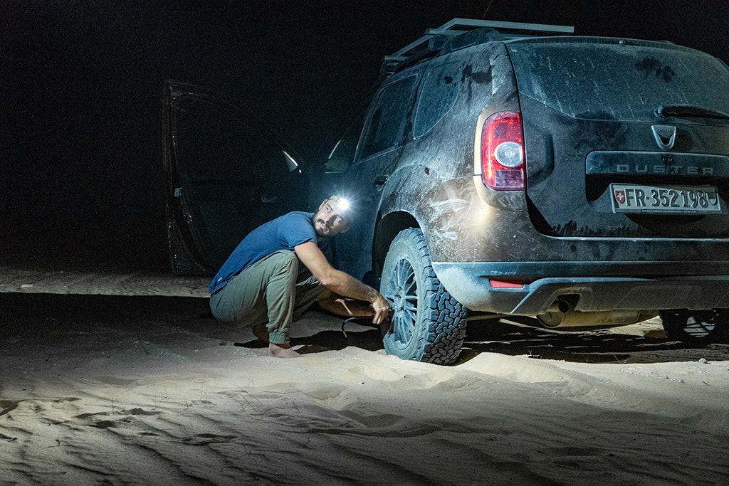Late night tire deflation in the desert of Saudi Arabia