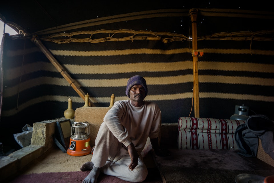 بداوة - Neshaun comes from Egypt, but he lives now in Kuwait and takes care of the sheep from the long ears. He is a good shepherd and them trust in to him. Kuwait, December 2018.