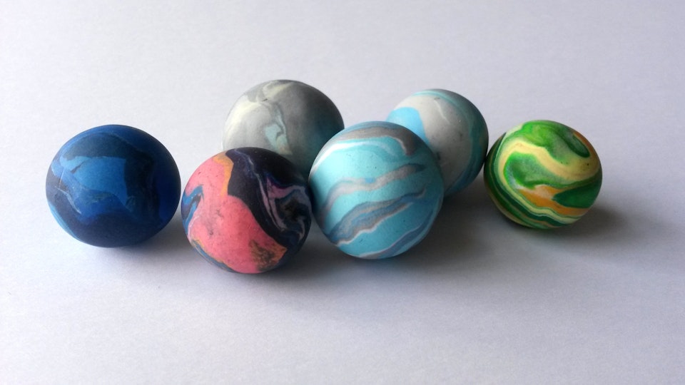 Clūds - The first batch of polymer clay marbles based on the pallettes of representations of skies in paintings from the Foundling collection.