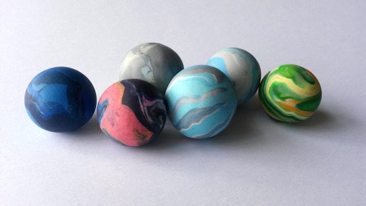The first batch of polymer clay marbles based on the pallettes of representations of skies in paintings from the Foundling collection.
